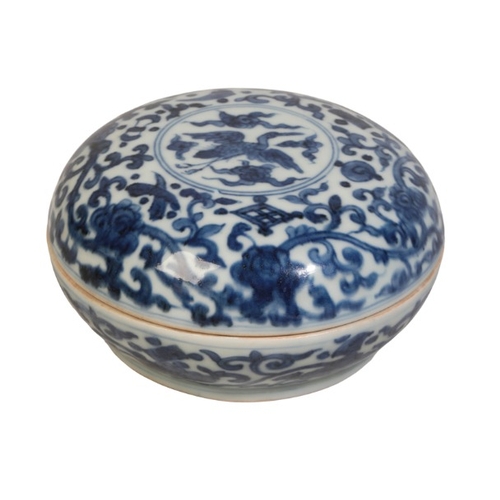 145 - A CHINESE BLUE AND WHITE CUSHION-SHAPED BOX AND COVER

with a divided interior, the lid with a centr... 