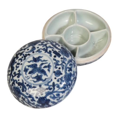 145 - A CHINESE BLUE AND WHITE CUSHION-SHAPED BOX AND COVER

with a divided interior, the lid with a centr... 