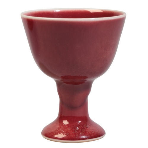 146 - A CHINESE RED-GLAZED STEM CUP

bearing a six character Yongzheng mark to the base but later, 6.5cm h... 