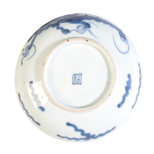 151 - SEVEN CHINESE BLUE AND WHITE VESSELS

19th century, four shallow dishes decorated with dragons chasi... 