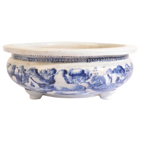 154 - A LARGE CHINESE BLUE AND WHITE TRIPOD CENSER

Qing dynasty, the compressed baluster sides painted in... 