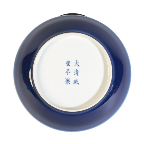 157 - A CHINESE MONOCHROME BLUE-GROUND BOWL

bearing a six character Xianfeng mark to the base, 19cm diame... 