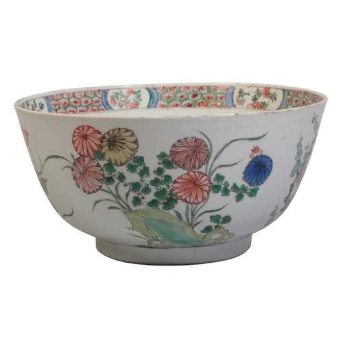 170 - A LARGE CHINESE EXPORT FAMILLE VERTE BOWL

18th century, decorated with chrysanthemums and various f... 