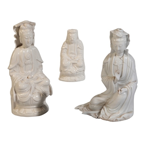 175 - THREE CHINESE BLANC DE CHINE FIGURES OF GUANYIN

19th century or later, all in seated contemplative ... 