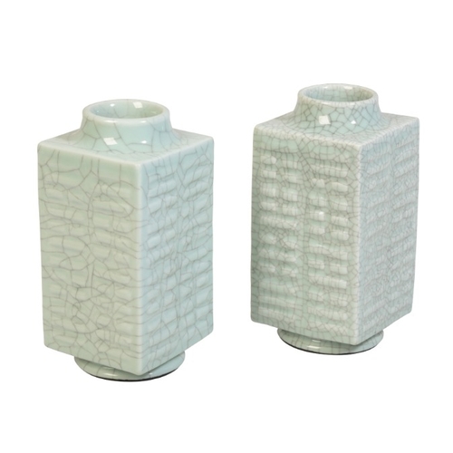 179 - A PAIR OF CHINESE PALE CELADON CONG

Qing or later, with moulded square bodies covered in lustrous c... 