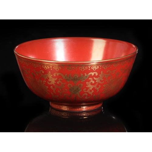 188 - A CHINESE CORAL-RED GLAZED BOWL

bearing six character Qianlong seal mark to the base and probably o... 