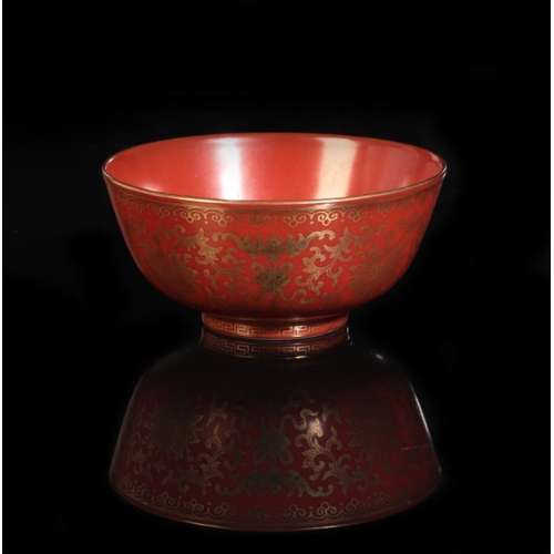 188 - A CHINESE CORAL-RED GLAZED BOWL

bearing six character Qianlong seal mark to the base and probably o... 