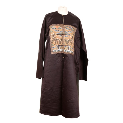 211 - A BLACK SILK CHINESE ROBE WITH QILIN MILITARY RANK BADGES

Qing or late 19th century, embroidered in... 