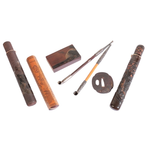 227 - A COLLECTION OF JAPANESE ITEMS

including three pipe cases, two pipes, and a lacquered match box cov... 