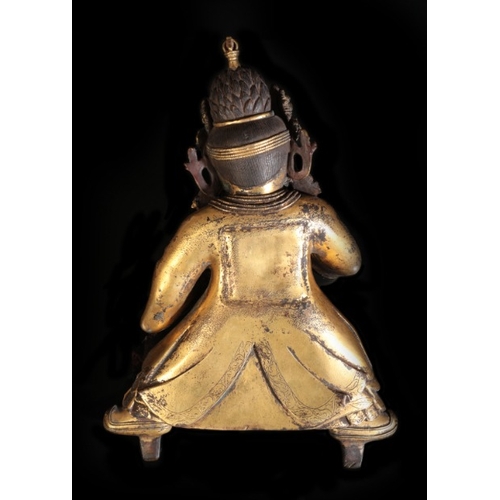 259 - A TIBETAN GILT BRONZE FIGURE OF MAHAKALA

Ming dynasty or later, figured in the form of Legden 'the ... 