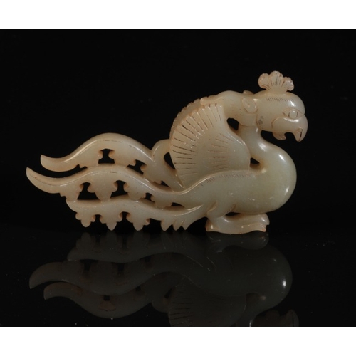 42 - A CHINESE GREY-GREEN JADE PHOENIX

Ming or later, with carved plumage, 9.5cm long

Provenance: A pri... 