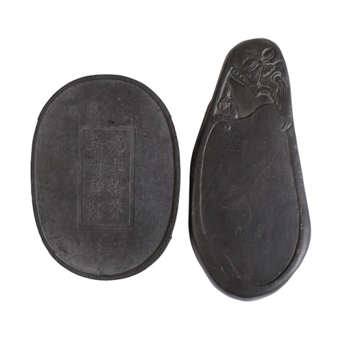 49 - A CHINESE INK STONE

carved in relief with a scholar and incised with script, eight character mark t... 