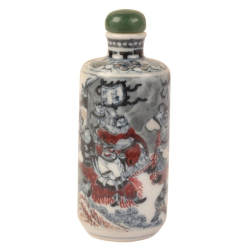 75 - A CHINESE SNUFF BOTTLE

bearing a tiger mark to the base, decorated in blue, white and red with figu... 