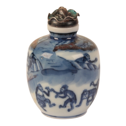 77 - A CHINESE BLUE AND WHITE SNUFF BOTTLE

bearing a six character Yongzheng mark to the base, decorated... 