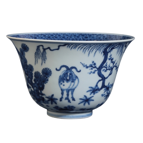 128 - A CHINESE BLUE AND WHITE BOWL early Qing or later, with an everted rim, decorated with goats in a la... 