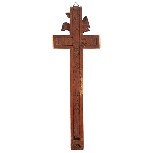 150 - A CONTINENTAL WALNUT RELIQUARY

in Medieval style but probably 19th century, a crucified Christ to t... 