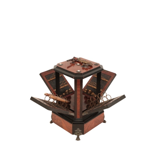 153 - A VICTORIAN WALNUT AND EBONISED MUSICAL CIGAR DISPENSER

the four mirrored sides opening forward to ... 