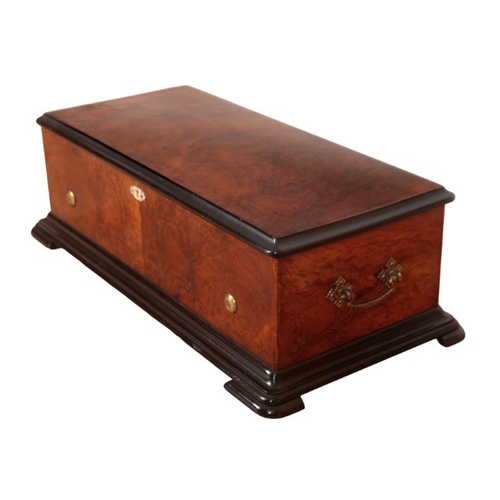 157 - A FRENCH FIGURED WALNUT MUSICAL BOX

19th century, with 33cm cylinder, the case with brass handles t... 