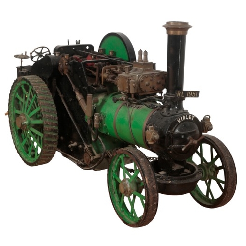 180 - A SCALE MODEL OF A STEAM TRACTION ENGINE

green-painted cast iron, registration plate 'RL 1951', 55c... 