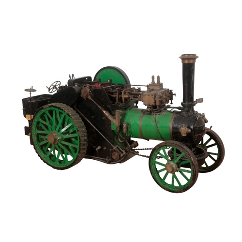 180 - A SCALE MODEL OF A STEAM TRACTION ENGINE

green-painted cast iron, registration plate 'RL 1951', 55c... 