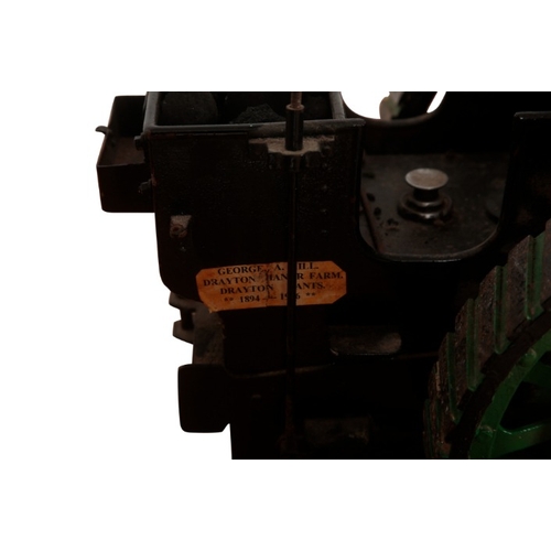 180 - A SCALE MODEL OF A STEAM TRACTION ENGINE

green-painted cast iron, registration plate 'RL 1951', 55c... 