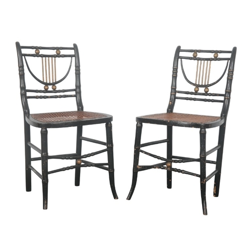 186 - A PAIR OF REGENCY HALL CHAIRS

mid-19th century, ebonised with parcel-gilt finish and faux bamboo ra... 