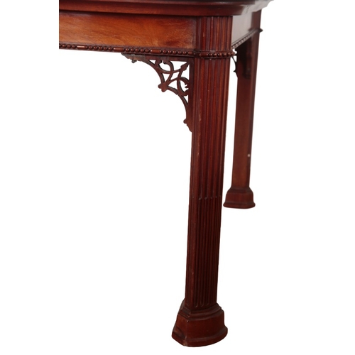 203 - AN EDWARDIAN FIGURED MAHOGANY LIBRARY TABLE

of Georgian design, the top with rounded corners, above... 