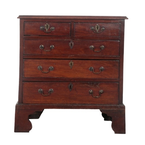 213 - A GEORGE III MAHOGANY SMALL CHEST OF DRAWERS

with two short and three long graduated drawers, on ta... 