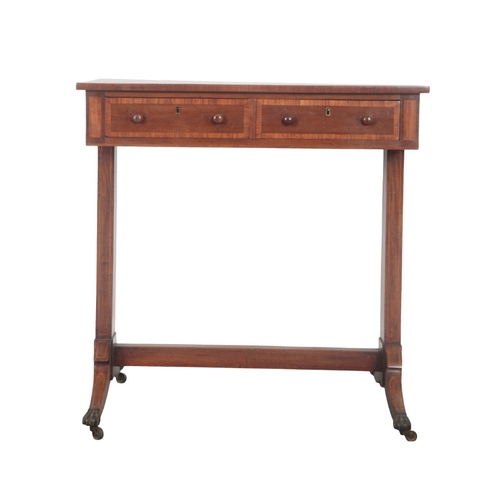 214 - A LATE GEORGE III MAHOGANY AND BRASS STRUNG WRITING TABLE

with two frieze drawers to one side and t... 