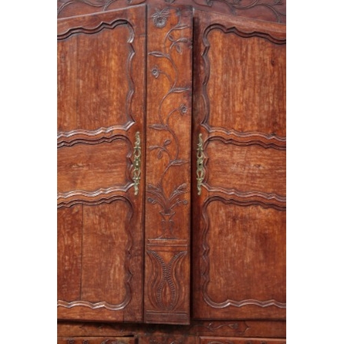 215 - A CONTINENTAL OAK ARMOIRE

18th/19th century, the moulded cornice over panelled cupboard doors, fine... 