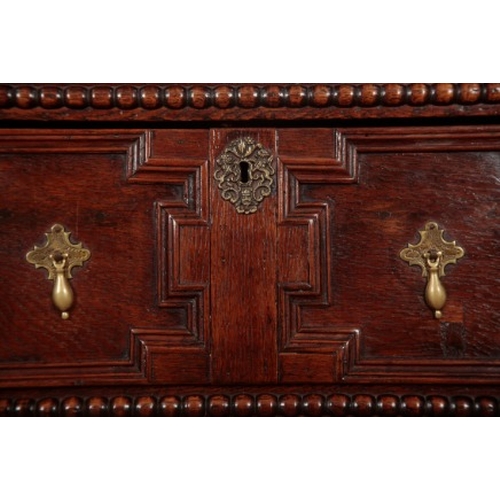 234 - AN OAK DRESSER BASE

late 17th/early 18th century, the three short drawers all with geometrically mo... 