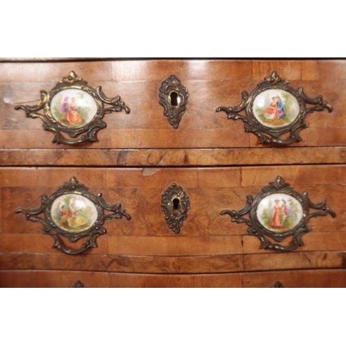 235 - A LOUIS XV STYLE SERPENTINE FRONT CHEST OF DRAWERS

the six short drawers all with gilt metal and en... 