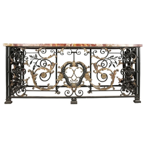 236 - AN IMPORTANT PAIR OF REGENCE WROUGHT IRON AND GILT CONSOLE TABLES

in the manner of Guillaume Cressa... 