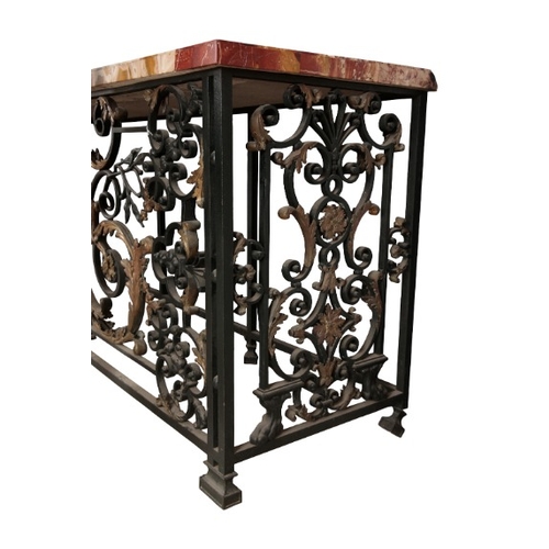 236 - AN IMPORTANT PAIR OF REGENCE WROUGHT IRON AND GILT CONSOLE TABLES

in the manner of Guillaume Cressa... 