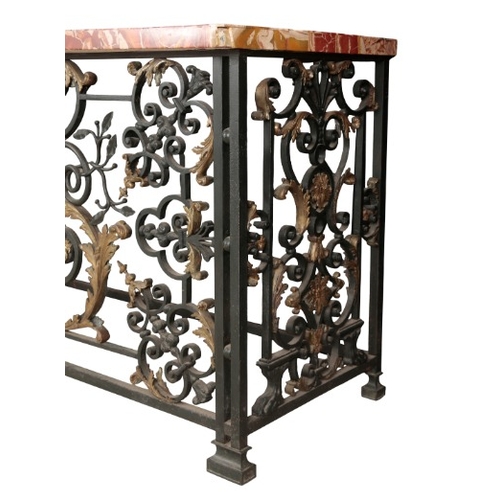 236 - AN IMPORTANT PAIR OF REGENCE WROUGHT IRON AND GILT CONSOLE TABLES

in the manner of Guillaume Cressa... 