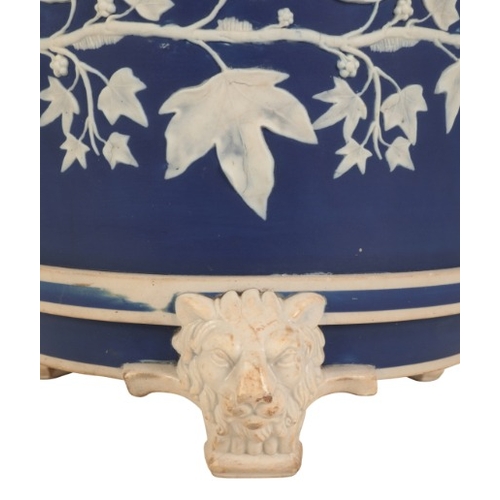 26 - A BLUE AND WHITE JASPERWARE POTTERY JARDINIÈRE

19th century, probably Wedgwood, with applied ivy le... 