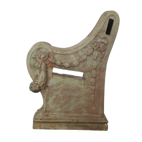 319 - A GREEN-PAINTED TERRACOTTA GARDEN BENCH

each of the scrolled ends moulded with floral swags and tra... 