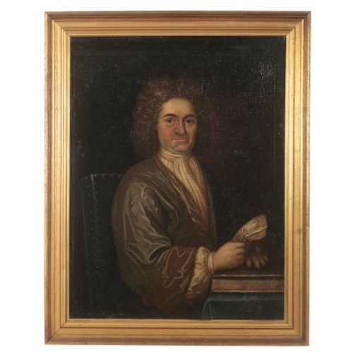 69 - ENGLISH SCHOOL, 18TH CENTURY A portrait of a gentleman

depicted half-length wearing a curled wig an... 