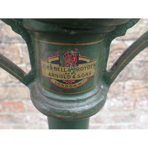 114 - JOHN BELL & ROYDEN ARNOLD AND SONS SCALES painted green, 88cms height with balance weights