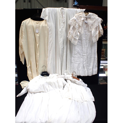 129 - A 1920s CREAM SILK PLEATED SHORT WEDDING DRESS with a quanitity of white cotton Victorian garments
