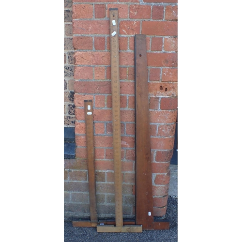 145 - THREE TRADITIONAL ARCHITECT'S SET SQUARES the longest to measure 48 inches
