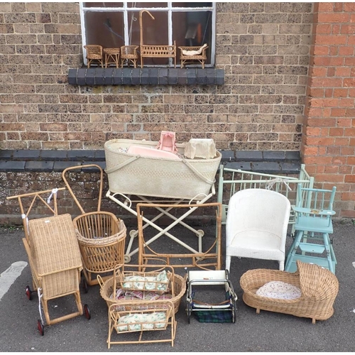 146 - A BABY'S COT ON STAND, AND OTHER NURSERY ITEMS including dolls cots, prams, wicker toy furniture and... 