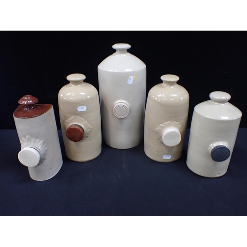 148 - FIVE STONEWARE HOT WATER BOTTLES one by Murray and Co, Glasgow