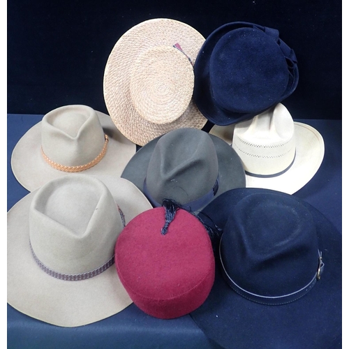 157 - AN AKUBRA FELT HAT with another and other hats including a girls school boater, a fez and a straw ha... 