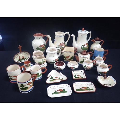 161 - A COLLECTION OF DEVON MOTTO WARE to include teapots, jugs and bowls