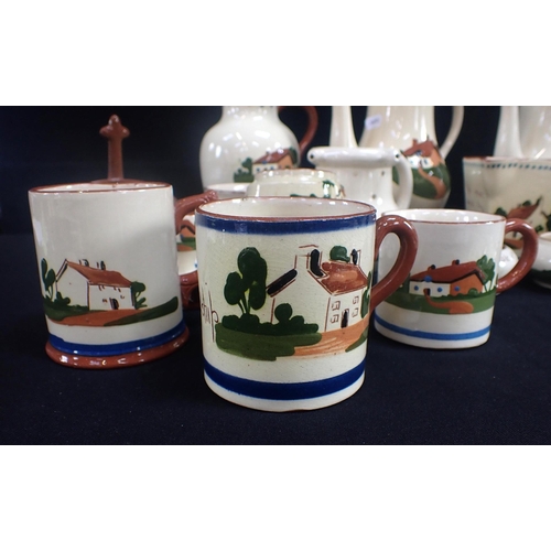 161 - A COLLECTION OF DEVON MOTTO WARE to include teapots, jugs and bowls