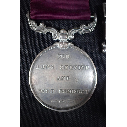 665 - VICTORIAN AFGHAN MEDAL WITH TWO BARS with a long service medal (2)