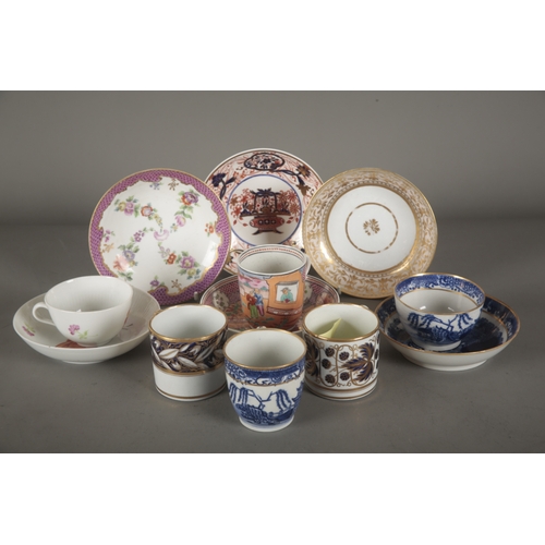 39a - A COLLECTION OF ENGLISH PORCELAIN TEAWARE comprising three coffee cans by Newhall, a teabowl and sau... 