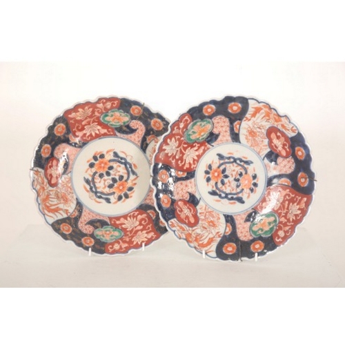 126 - FOUR JAPANESE IMARI PLATES

late 19th or early 20th century, including a pair of plates with entwine... 