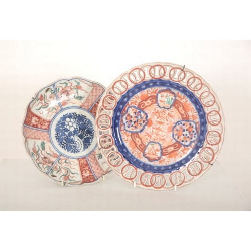 126 - FOUR JAPANESE IMARI PLATES

late 19th or early 20th century, including a pair of plates with entwine... 